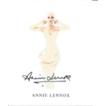 Annie Lennox signed 10 x 8 inch colour photo in sexy dress. Good Condition. All autographed items