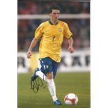 Football Elano 12x8 signed colour photo pictured in action for Brazil. Good Condition. All