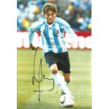 Football Gabriel Heinze 12x8 signed colour photo pictured in action for Argentina. Good Condition.