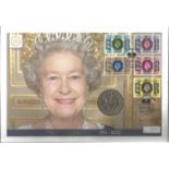 The Queens golden jubilee large coin cover with coin inset. Numbered 00504. Good condition. We