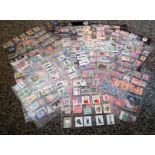 Worldwide stamp collection 32 loose album sleeves packed with interesting stamps from around the