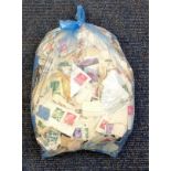 Worldwide stamp collection glory bag hundreds of stamps used cleaned mostly 1930s, 40s and 50s