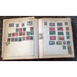 Stamp Collection housed in a Strand album containing stamps from the late 1800s to mid-1950s