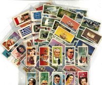 Cigarette card collection. 6 sets. Famous people 1969 - 45 cards. Flags and emblems 1967 - 41 cards,