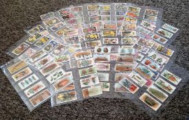 Cigarette card collections by WD Howells and Gallaher. Includes 1923 Gardening hints 47 cards,