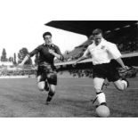 Football Tom Finney signed 16x12 black and white photo pictured in action for England. Good