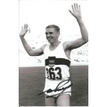 Olympics Armin Hary signed 6x4 black and white photo of the gold medallist in the 100 meters and the