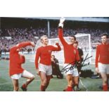 Football Geoff Hurst signed 12x8 colour photo pictured celebrating after the 1966 World Cup Final.