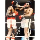 Boxing Larry Holmes signed 16x12 colour photo pictured in his WBC world heavyweight title fight with