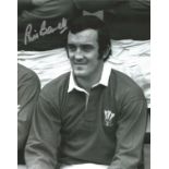 Rugby Union Phil Bennett signed 10x8 black and white photo pictured in Wales kit. Good Condition.