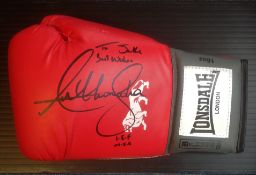 Boxing Anthony Joshua signed Lonsdale boxing glove. Anthony Oluwafemi Olaseni Joshua, OBE is a