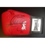 Boxing Anthony Joshua signed Lonsdale boxing glove. Anthony Oluwafemi Olaseni Joshua, OBE is a