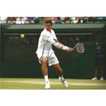 Tennis Milos Raonic signed 12x8 colour photo pictured in action at Wimbledon. Milos Raonic (born