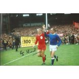 Football Roger Hunt signed 12x8 colour photo pictured parading the Jules Rimet Trophy with Ray