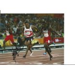 Athletics Zharnel Hughes 10x8 signed colour photo pictured in action at the Commonwealth Games. Good