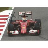 Motor Racing Sebastian Vettel signed 12x8 colour photo pictured driving for Ferrari. Good Condition.