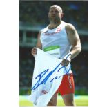 Olympics Piotr Malachowske signed 6x4 colour photo of the double silver medallist in the discus