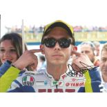 Moto GP Valentino Rossi signed 12x8 colour photo. Rossi is widely considered one of the greatest