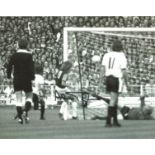 Football Alan Taylor signed 10x8 black and white photo pictured scoring for West Ham United in the