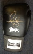 Boxing Anthony Joshua signed Lonsdale boxing glove. Anthony Oluwafemi Olaseni Joshua, OBE is a