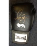 Boxing Anthony Joshua signed Lonsdale boxing glove. Anthony Oluwafemi Olaseni Joshua, OBE is a