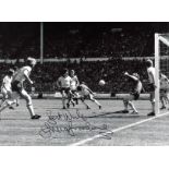 Trevor Brooking signed 16x12 black and white photo. Good Condition. All autographed items are