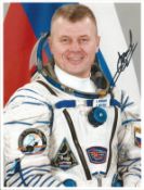 Cosmonaut Oleg Novitsky signed 12 x 8 space suit photo, Space missions: Soyuz MS-03, Expedition