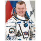 Cosmonaut Oleg Novitsky signed 12 x 8 space suit photo, Space missions: Soyuz MS-03, Expedition