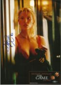 Deborah Kara Unger signed 10 x 8 inch colour photo from the movie The Game. Good Condition. All