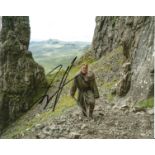 Charlie Hunnam signed 10 x 8 inch colour photo with Sword in hand. Good Condition. All autographed