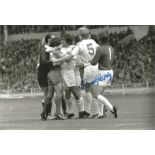 DAVID HARVEY 1974, football autographed 12 x 8 photo, a superb image depicting Leeds United