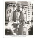 George Burns signed 10 x 8 inch b w photo playing a guitar from Stg Pepper's Lonely Hearts Club
