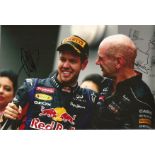 Formula One Sebastian Vettel and Adrian Newey signed 12 x 8 inch colour Red Bull photo. Good