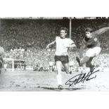 Football Geoff Hurst signed 10 x 8 inch b w photo. Good Condition. All autographed items are genuine