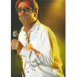 Music Huey Lewis signed 12 x 8 inch colour photo. Good Condition. All autographed items are