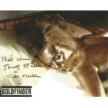 James Bond Goldfinger Shirley Eaton signed 10 x 8 inch colour photo lying on bed. She has added Jill