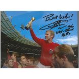 Geoff Hurst signed 7 x 5 inch colour 1966 celebration football photo. Good Condition. All