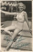 Betty Grable signed 6 x 4 inch b/w postcard, to Elizabeth. Some wear and tear. Good Condition. All