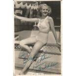 Betty Grable signed 6 x 4 inch b/w postcard, to Elizabeth. Some wear and tear. Good Condition. All