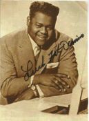 Music Fats Domino signed 7 x 5 inch b/w photo. Good Condition. All autographed items are genuine