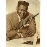 Music Fats Domino signed 7 x 5 inch b/w photo. Good Condition. All autographed items are genuine