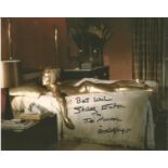 James Bond Goldfinger Shirley Eaton signed 10 x 8 inch colour photo lying on bed. She has added Jill