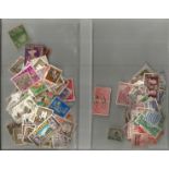 British Commonwealth stamp collection accumulation stamps on paper in two bags a lot of items over