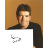 Simon Cowell signed white card with 10x8 colour photo. Good Condition. All autographs are genuine