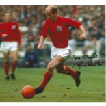 Bobby Charlton signed 8x6 colour 66 photo. Good Condition. All autographs are genuine hand signed