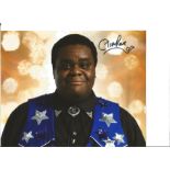Clive Rowe 8x10 signed Dr Who colour photo. Clive Mark Rowe, MBE (born 27 March 1964) is a British