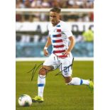 Football Tyler Boyd signed 12x8 colour photo pictured in action for the USA. Good Condition. All