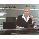 007 James Bond. James Bond 8x10 movie scene photo signed by actress Dame Judi Dench as M. She has,
