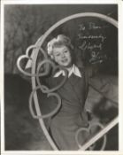 Glynis Johns signed 10x8 black and white photo. Dedicated. Few marks. Good Condition. All autographs