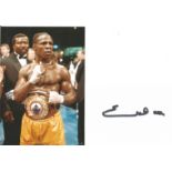 CHRIS EUBANK signed page with 5x7 Boxing Photo . Good Condition. All autographs are genuine hand